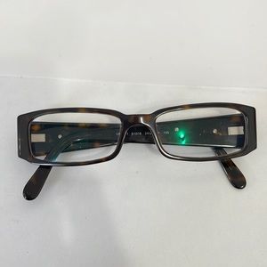 Prada Reading Glasses price reduced due to scratches.